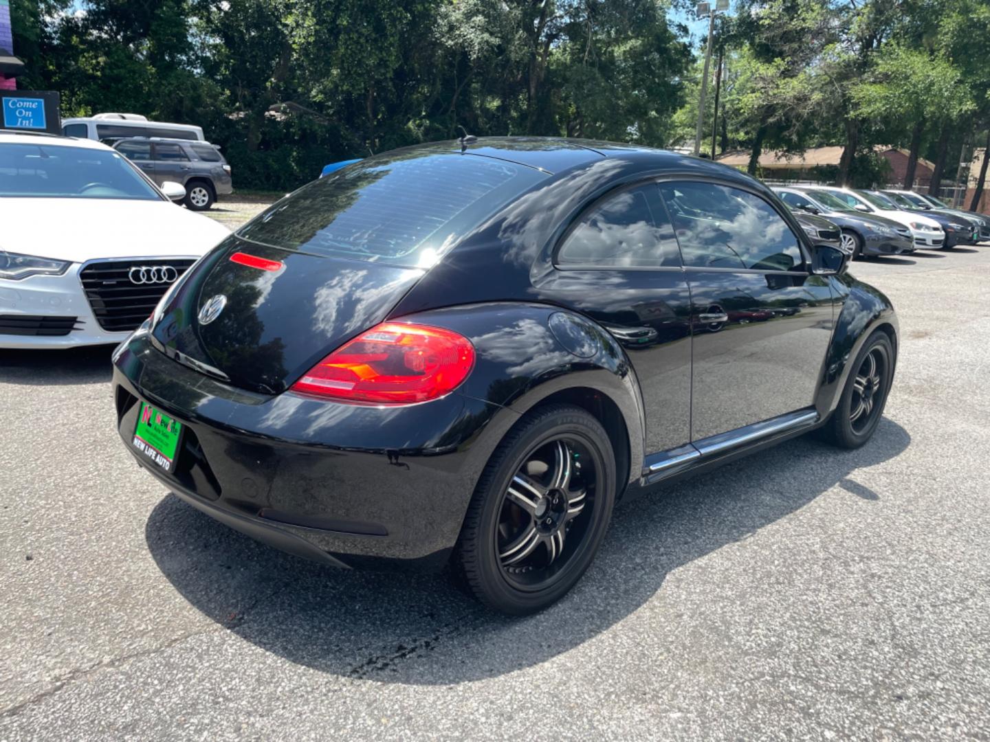 2012 BLACK VOLKSWAGEN BEETLE 2.5L PZEV (3VWJP7AT0CM) with an 2.5L engine, Automatic transmission, located at 5103 Dorchester Rd., Charleston, SC, 29418-5607, (843) 767-1122, 36.245171, -115.228050 - Local Trade-in with Leather, CD/AUX/Bluetooth, Hands-free Phone, Power Windows, Power Locks, Power Mirrors, All-weather Mats, Keyless Entry, Alloy Wheels. Clean CarFax (no accidents reported!) Only 68k miles! Located at New Life Auto Sales! 2023 WINNER for Post & Courier's Charleston's Choice Pre - Photo#7